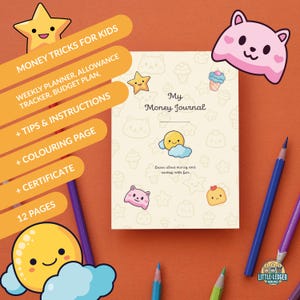 May include: A children's money journal with a cream-colored cover featuring cartoon illustrations of stars, clouds, and animals. The journal includes a weekly planner, budget plan, and coloring pages. The text on the cover reads "My Money Journal."