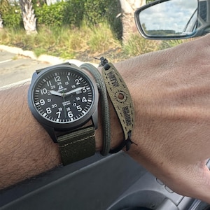 Paracord Sheathed Frameless Slingshot Bracelet - 1632 Black Tubing | SlingTheory