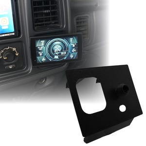 May include: A black digital gauge display with blue and white readouts is mounted in a vehicle's dashboard. A separate black mounting bracket is shown in the foreground. The gauge displays various vehicle performance metrics.