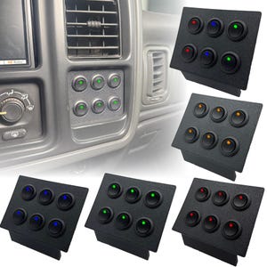 May include: Black switch panels with illuminated round buttons in various colors, including green, blue, and orange. The panels are designed for automotive use and are shown installed in a vehicle's dashboard.