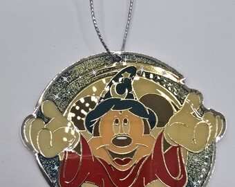 Vintage official Disney ornament of Mickey Mouse dressed as a sorcerer or wizard, as seen in the movie "Fantasia"