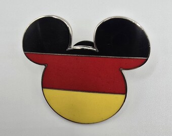 Pin oficial vintage de Disney con los colores de la bandera de Alemania dentro de la forma de la cabeza y las orejas de Mickey Mouse.