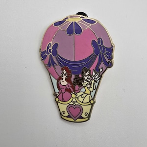 Vintage official Disney pin that shows Ariel from The Little Mermaid and Belle from Beauty and the Beast in a hot air balloon image 1