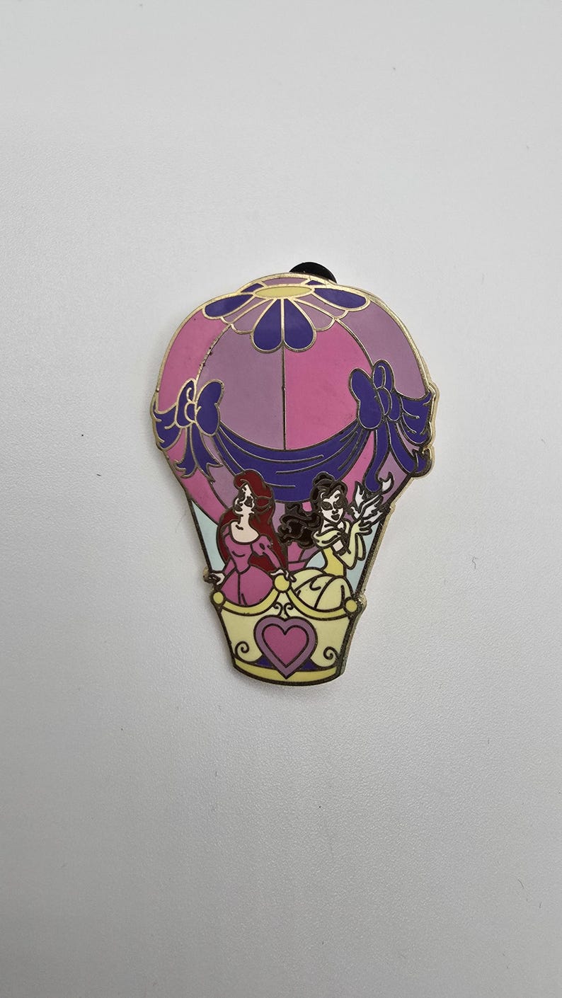 Vintage official Disney pin that shows Ariel from The Little Mermaid and Belle from Beauty and the Beast in a hot air balloon image 1