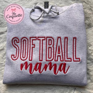 May include: A rustic wooden sign with the text "Welcome to our home" in white lettering. The sign features a distressed finish and a simple, inviting design, perfect for entryway decor.