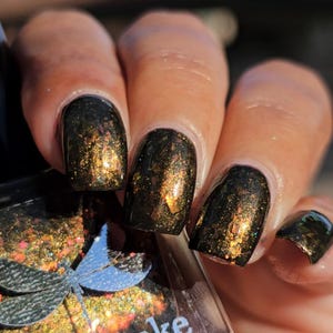 Night Fire ~ black nail polish with red and orange flakes