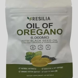 May include: A white stand-up pouch of Resilia Oil of Oregano 6,000mg dietary supplement with black seed oil. The label features green text, three golden softgel capsules, green oregano leaves, and black seeds. It contains 60 softgels total.