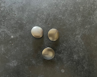 One Vintage CHANEL buttons silver dipped CHANEL featured on buttons Circa 1990's