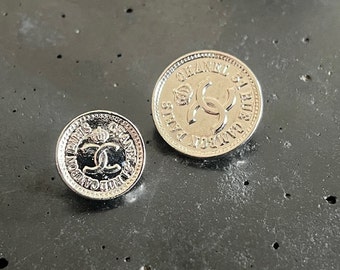 set 2 Silver CHANEL button SET Circa 1990's