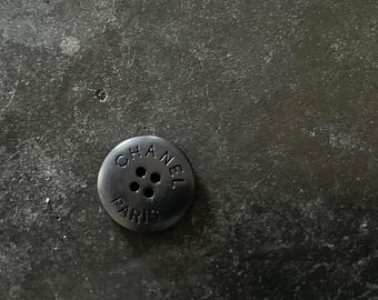 One Vintage CHANEL button shiny resin CHANEL featured on buttons Circa 1990's