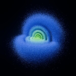 May include: An abstract composition of blue and green granules against a black background. The granules are arranged in concentric arcs, creating a visual effect reminiscent of a stylized cloud or a celestial body.