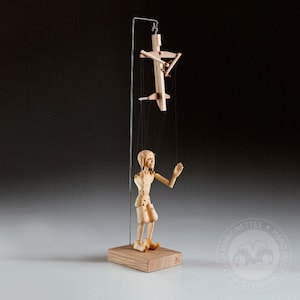 The smallest Jester marionette in the world – precisely hand-carved from a linden wood