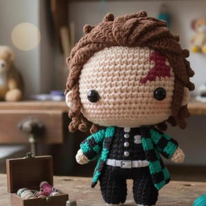 May include: A crocheted doll of a character with brown hair and a forehead scar. The doll is dressed in a black and green chequered jacket, black trousers, and a white belt. It stands on a wooden surface.