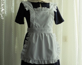 May include: A white and black maid dress with a white apron and ruffled trim. The dress has a white collar and a black bow. The text "Bitter & Sweet" is printed on the bottom of the image.