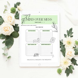 May include: A digital desk pad with the text "MIND OVER MESS" and "TODAY'S DATE" in a green banner. The pad is surrounded by white roses and green foliage. The pad includes sections labeled "ON THE COUCH", "DOCS ON DECK", "DON'T GHOST 'EM", and "EVERYTHING ELSE-Y".