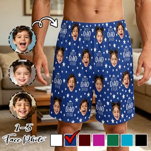May include: Blue boxer shorts with a repeating pattern of children's faces, white stars, and the text "BEST DAD EVER." The shorts are designed to be personalized with 1-5 face photos.