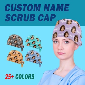 May include: A custom scrub cap featuring a repeating pattern of a person's face and the name Angela printed in white script. The cap is shown in lavender, gray, teal, orange, and blue. The text CUSTOM NAME SCRUB CAP and 25+ COLORS is visible.