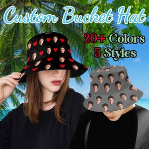 May include: Custom bucket hats with personalized photo prints. One hat is black with red hearts and faces, the other is gray with faces. The image also shows text that says "20+ Colors" and "5 Styles".