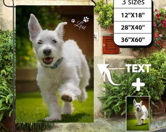 May include: A white dog with a blue collar running on green grass is featured on a garden flag. The flag has the name "Lexi" and paw prints. Text on the flag indicates three size options: 12"x18", 28"x40", and 36"x60", plus five style options.