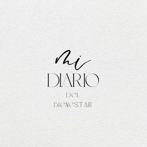 May include: A minimalist design with the words "Mi Diario del Bienestar" in black script and serif fonts. A small black heart is at the bottom. The background is a textured, off-white color.