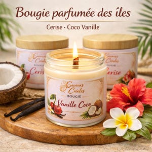 May include: Lit candle in a glass jar with a wooden lid, labelled "Vanille Coco" and "Cerise". The image includes a coconut, vanilla beans, and tropical flowers. The text reads "Bougie parfum&eacute;e des &icirc;les".