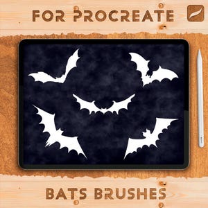 May include: A digital art design featuring white bat silhouettes on a dark blue background, displayed on a tablet. The words "FOR PROCREATE" and "BATS BRUSHES" are carved into the wooden surface. A white stylus is placed on the right.