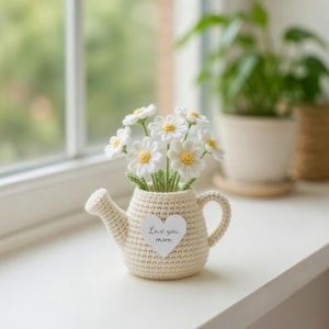 May include: A rustic wooden sign with the text "Welcome to our home" in white lettering. The sign features a distressed finish and a simple, inviting design, perfect for entryway decor.