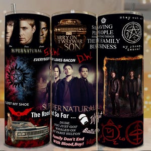 May include: A set of three stainless steel tumblers featuring images and text from the television show Supernatural. The tumblers have black backgrounds with images of the main characters, the show's logo, and phrases like "Saving People, Hunting Things, The Family Business."
