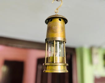 Antieke ankerolielamp messing en koper nautisch maritiem schip lantaarn bootlamp