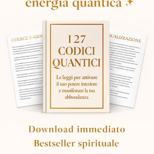May include: A book titled "127 Codici Quantici" with gold lettering and a white cover, with loose pages. The text includes "Attiva la tua energia quantica" and "Download immediato Bestseller spirituale".