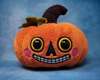 Calabaza de peluche de la pradera Jack O Lantern