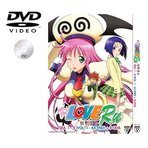 Puede incluir: Un DVD de vídeo de la serie de anime "To Love Ru". La carátula presenta personajes de anime con pelo rosa y azul. La caja del DVD incluye el título de la serie e información de los episodios.