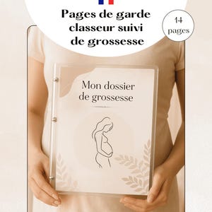 Peut inclure: Un classeur transparent avec le texte "Mon dossier de grossesse" et "Pages de garde classeur suivi de grossesse". La couverture présente un dessin au trait d'une personne enceinte. Le classeur contient 14 pages.