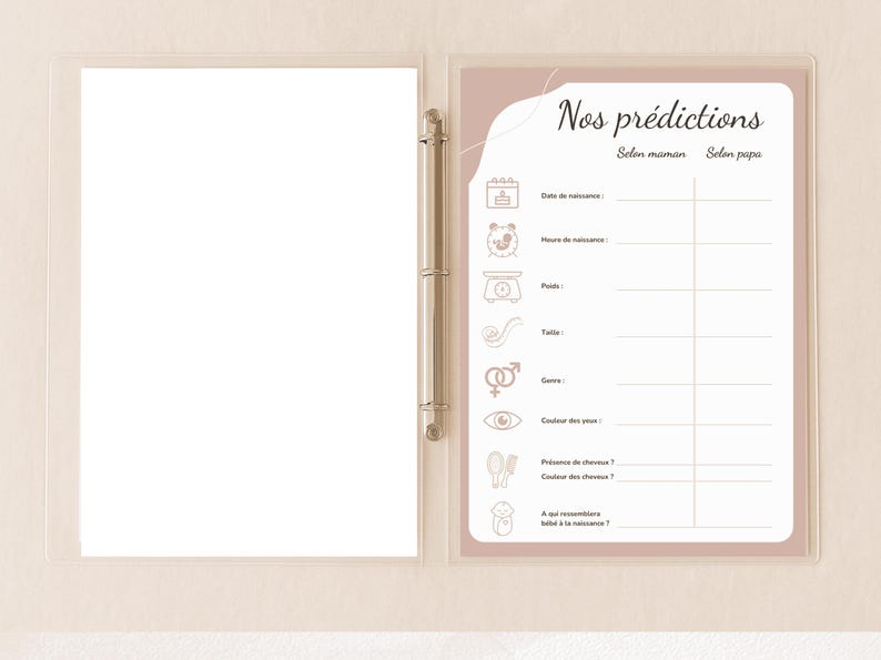 May include: A clear binder with a baby shower prediction game sheet. The sheet has a pink border and features the text "Nos pr&eacute;dictions" and prompts for birth date, time, weight, and other details. The binder is open.
