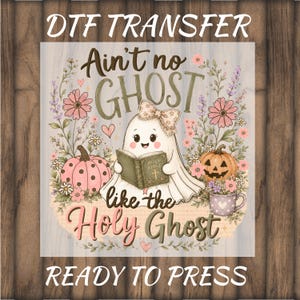 May include: A DTF transfer sheet featuring a cartoon ghost wearing a patterned bow, holding a book labeled Holy Bible. The design includes pink pumpkins, flowers, and the text Ain't no GHOST like the Holy Ghost. The sheet is marked Ready to Press.