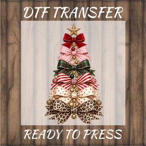 May include: A DTF transfer ready to press featuring a Christmas tree graphic composed of stacked fabric bows in red, pink gingham, green plaid, red and white stripes, cream with polka dots, and leopard print, topped with a gold star.