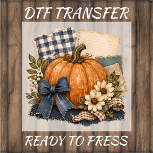 May include: A DTF transfer ready to press featuring a central orange pumpkin, a blue denim bow, white flowers, and blue gingham patterned paper accents. The design includes text reading DTF TRANSFER at the top and READY TO PRESS at the bottom.