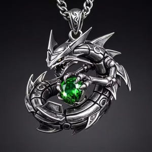 May include: A silver-toned dragon pendant necklace. The dragon is intricately detailed, holding a large, round, green gemstone. The pendant hangs from a matching chain. The dragon's design features sharp edges and a menacing expression, creating a bold statement piece.