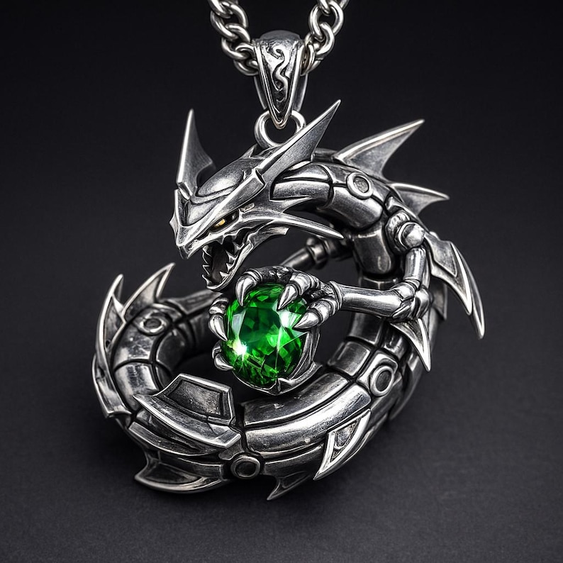 May include: A silver dragon pendant necklace. The dragon is intricately detailed, holding a large, round, green gemstone. The pendant hangs from a silver chain. The dragon has sharp features and yellow eyes, with a dark background.