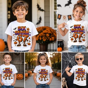 May include: A white short-sleeve t-shirt featuring a graphic print with the text "SIX SEVEN 67" in orange and purple. The design includes cartoon-style numbers with arms and legs, surrounded by small pumpkins, bats, and candy corn illustrations.
