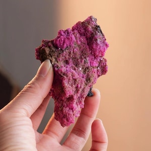 Natural ruby raw stone, chrome corundum, bare stone, rough material, large block of aromatic stone, mineral specimen, red corundum ornament