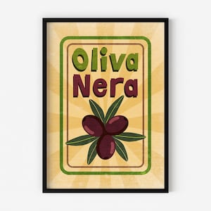 May include: Framed art print featuring the words "Oliva Nera" in green and burgundy, with a cluster of three dark purple olives and green leaves. The background is a light yellow with radiating lines, all within a black frame.