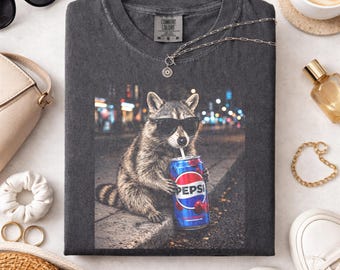Cool Raccoon Wild Cherry Soda Graphic Tee, Fun Animal Lover Shirt, Vintage Raccoons Diet Drinks Shirt, Funny Meme Genz Dank Raccoons Shirt