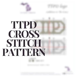 Peut inclure: Une page blanche avec le texte "TTPD CROSS STITCH PATTERN" en violet foncé. L'image comprend également un graphique flou d'un motif de point de croix et un contour violet de l'État du Michigan.