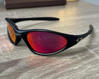 オークリー ミニッツ 1.0：マットブラック Y2K ラップサングラス