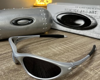 Oakley minute ブラック サングラス il_fullxfull.7271233065_jmqz.jpg