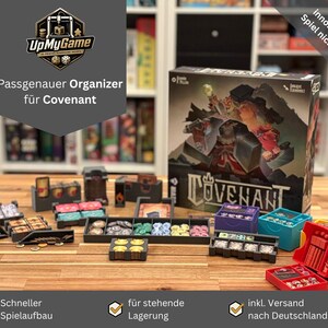 Peut inclure: Un ensemble d'organisateur de jeu de société avec divers conteneurs noirs, rouges, bleus et jaunes, et une boîte de jeu intitulée "Covenant". L'organisateur est conçu pour contenir des composants de jeu. Le texte sur la boîte indique "UpMyGame" et "Passgenauer Organizer für Covenant."