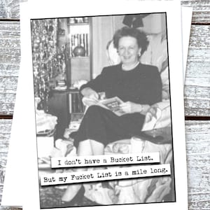 May include: A black and white photo of a woman sitting in a chair reading a book. The text below the photo reads "I don't have a Bucket List. But my Fucket List is a mile long."