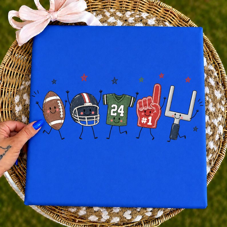 May include: A bright blue square canvas featuring a cartoon illustration of five football-themed characters with smiling faces and thin black limbs. The characters include a brown football, a black helmet, a green jersey with the number 24, a red foam finger with the text #1, and a white goalpost, all accented by small red and blue stars.