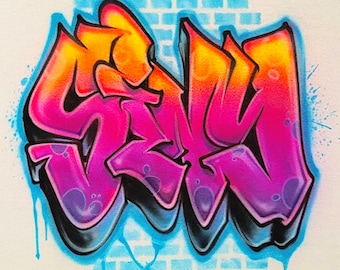 Personalized Graffiti Name Hoodie | Vibrant Purple & Orange Urban Airbrush Design | Custom Streetwear Pullover